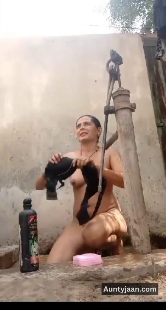 muslim aunty outdoor bath bathing
